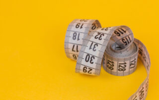 An image of a roll of measuring tape